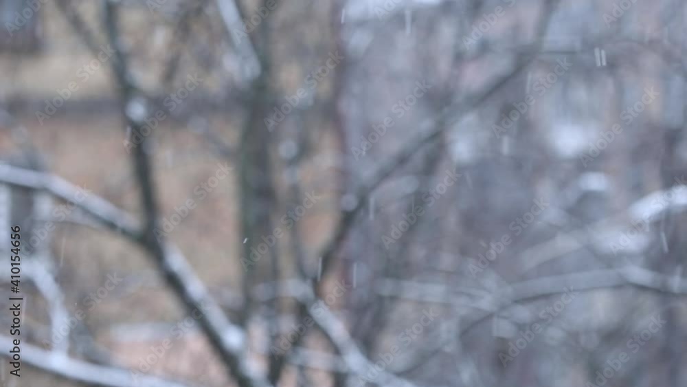Snow falling in the city in winter season with blurred background. Snowstorm, Kiev, Ukraine. Snow falling in the city in winter season with blurred background. Snowstorm, Kiev, Ukraine.