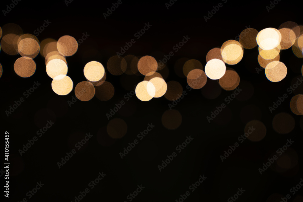 Fototapeta premium Golden abstract bokeh background. Wave shape. Bokeh frame. Pop Art.