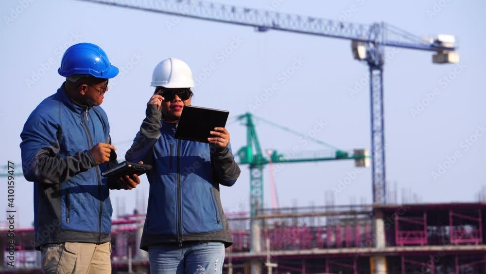 Inspecting Engineer in Construction Site Inspecting Engineer in Construction Site