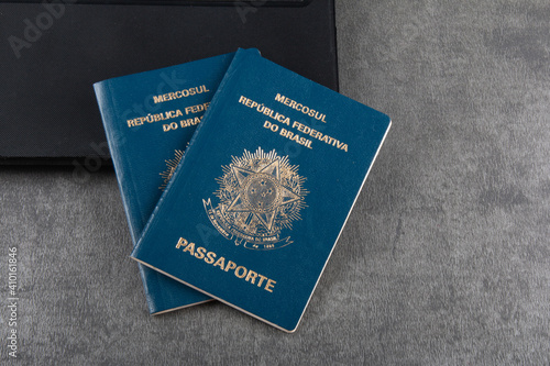 Brazilian passport on gray background with copy space