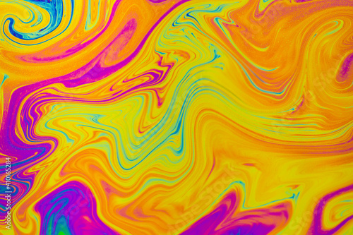 Psychedelic multicolored patterns background. Photo macro shot of soap bubbles.