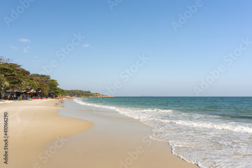 Beach and waves tropical sea with blue sky on sunny day background. copy space