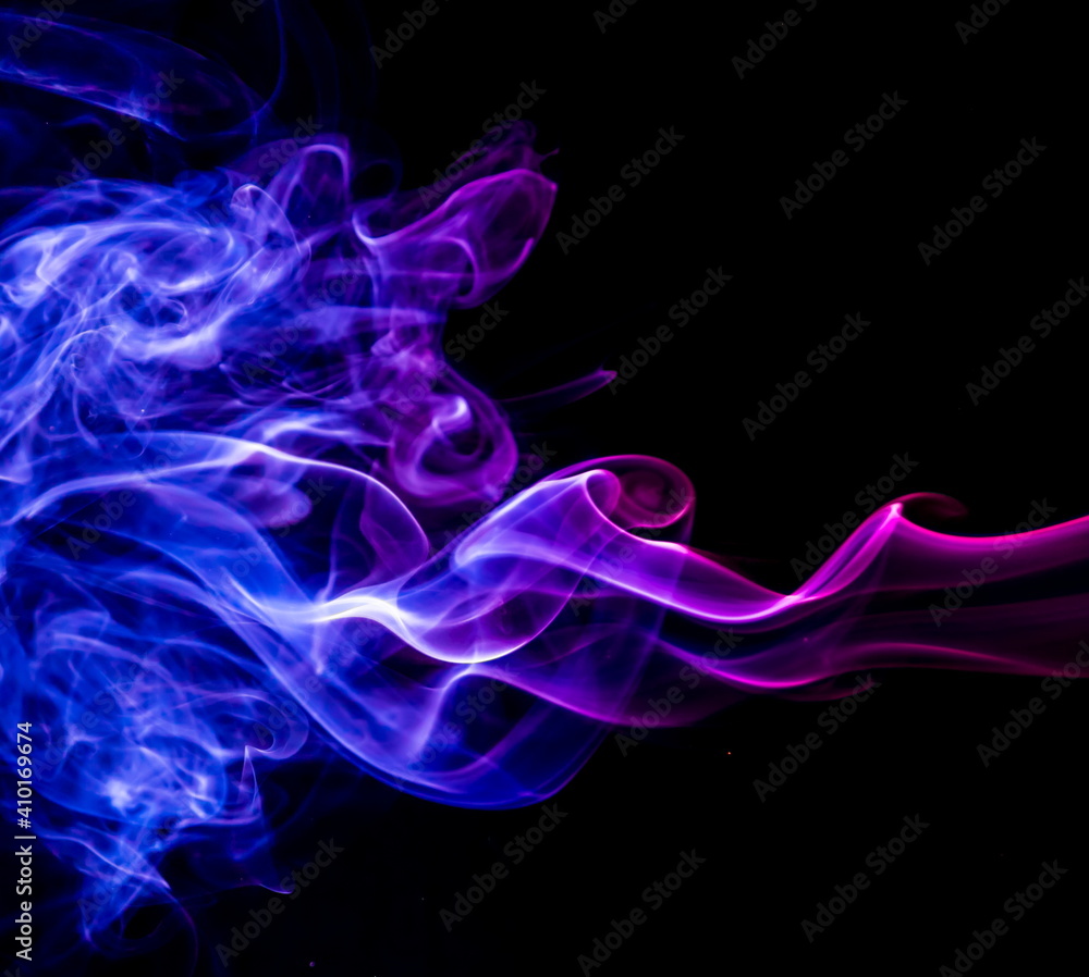 Colored smoke on black background Colored smoke on black background