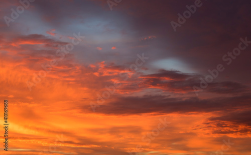Clouds at sunset, amazing sky, nature background © yauhenka