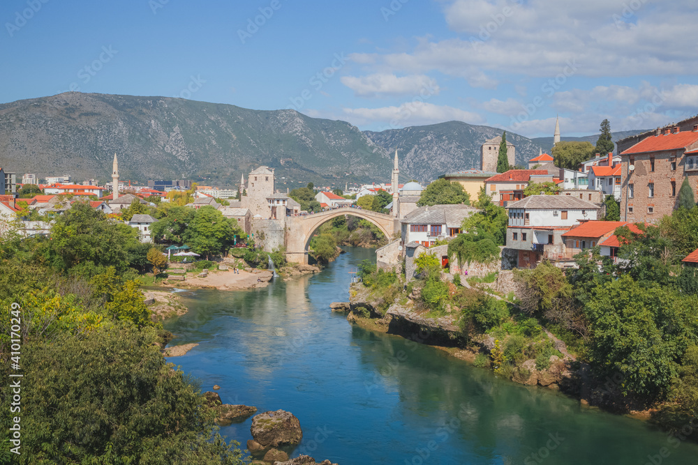 Classic view of Stari Most over the Neretva River the old town of Mostar, Bosnia & Herzegovina, on a clear sunny summer day.