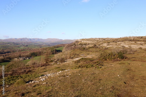 View along Scout Scar an impressive ridge of Limestone cliffs in south Cumbria with views to the Lake District fells.
