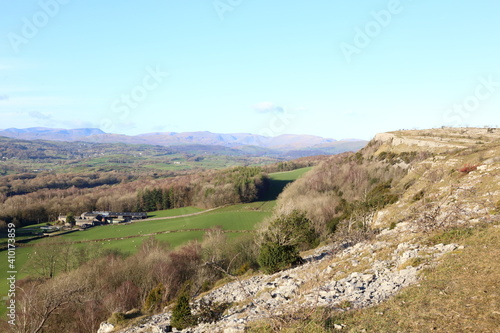 View from Scout Scar, Cumbria, across the Lyth Valley towards the mountains of the central Lake District National Park.