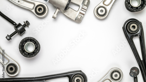 White car part. Set of new metal car part. Auto motor mechanic spare or automotive piece isolated on white background. Technology of mechanical gear with space for text.