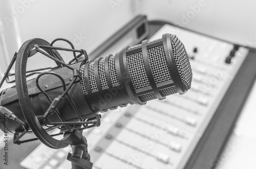 Professional microphone and sound mixer in radio station studio