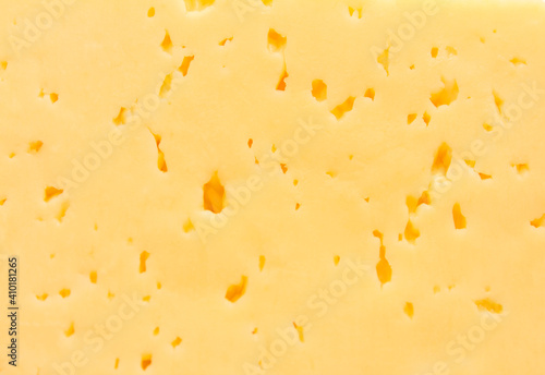 Yellow cheese close up. Cheese texture.