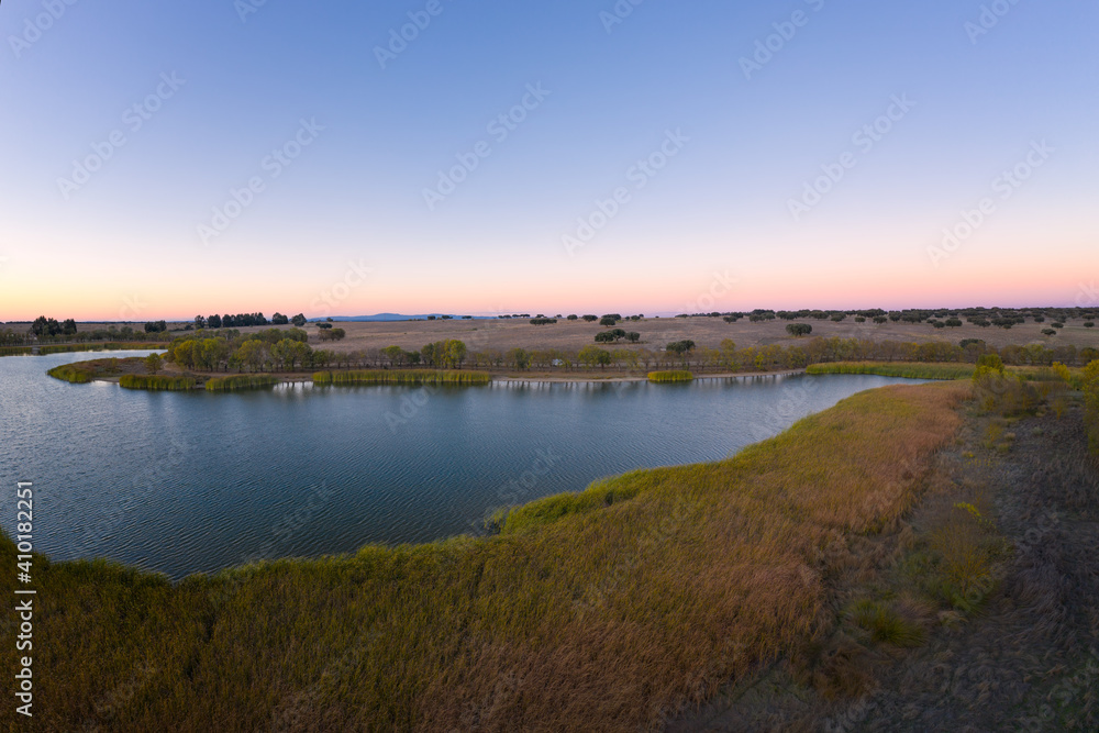 Lake drone aerial view at sunset in Alentejo, Portugal