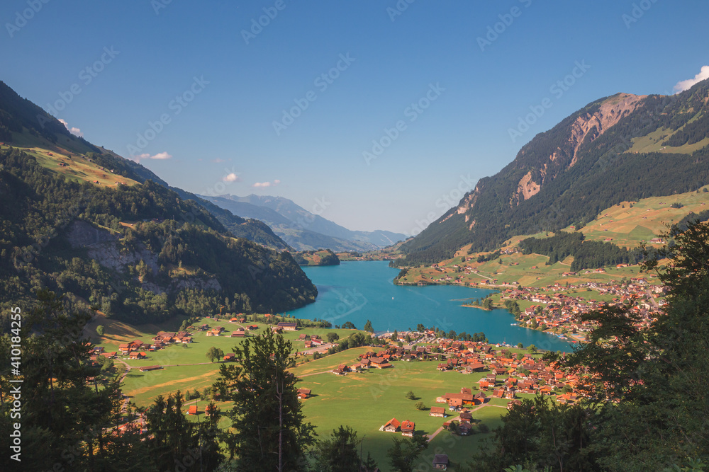 A view over the beautiful Lake Lungern (Lungerersee) on a clear sunny day taken from Schoenbuehel viewing point.