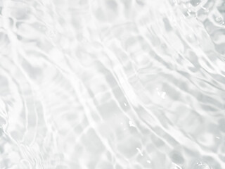 Ripple water texture on white background. Shadow of water on sunlight. Mockup for product, spa or travel background. Marble blue water surface as wallpaper background