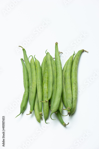 Bunch of fresh green whole beans isolated on white background