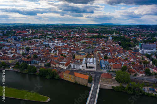 Aerial view of the old town of the city Volkach in Germany on a sunny day in spring. 