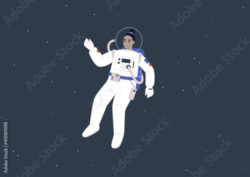 Young female Asian astronaut wearing a spacesuit floating between the stars