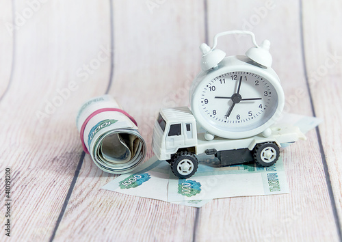 Children's car, money and watch. Compliance with commercial cargo transportation laws