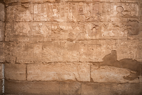 ancient Egyptian hieroglyphs on a wall in the Karnak Temple of Luxor