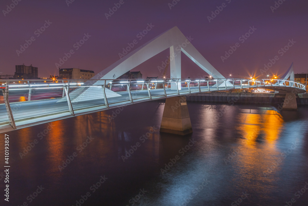 Squiggly Bridge at night over the River Clyde in Glasgow, Scotland