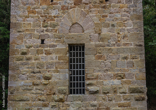 Wallpaper Mural Detail of the ruins of Abbey of San Rabano, Alberese, Italy. Old furnace with collapsed bricks. Ancient stones with the vegetation that has grown on it. Torontodigital.ca