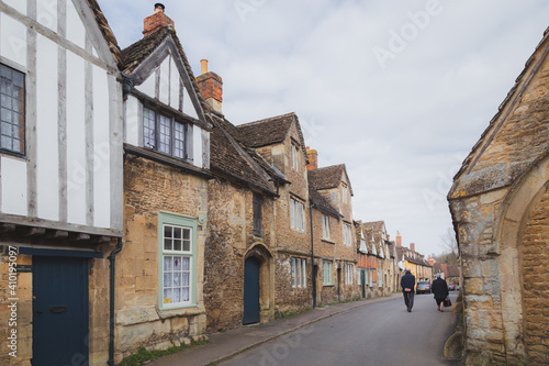 The historic and well preserved village of Lacock  in county Wiltshire  England is popular tourist stop.