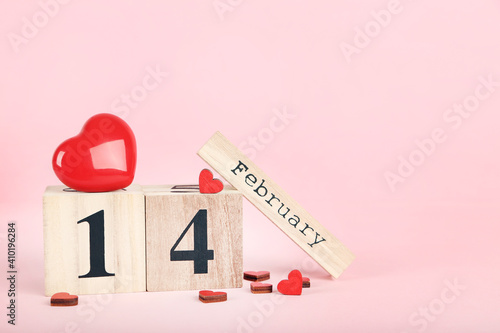 February block calendar with red hearts on pink background