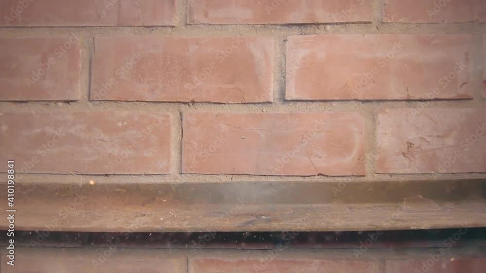 Petard Exploaded Against the Brick Wall. Many Small Particles Flew in Different Directions - Static Shot Petard Exploaded Against the Brick Wall. Many Small Particles Flew in Different Directions - Static Shot