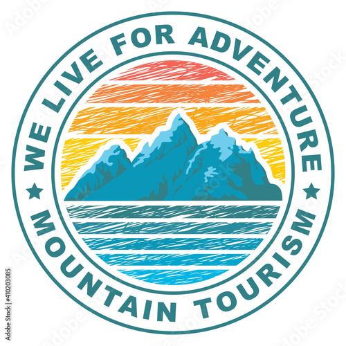 Round travel banner or label in retro style with snow-capped mountains in sunrise colors and the words We live for adventure, mountain tourism. Suitable for vector pennant, emblem, logo, label, flyer