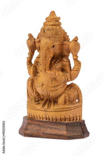 Sandalwood sculpture Ganesh isolated on white background. Carved wooden elephant god Ganesh