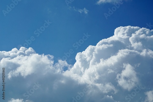 Fluffy clouds with a blue sky