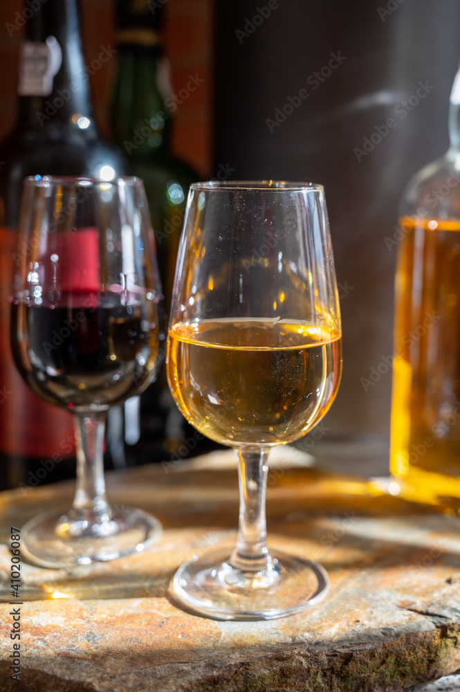 Tasting of Portuguese fortified port wine, produced in Douro Valley, North of Portugal Tasting of Portuguese fortified port wine, produced in Douro Valley, North of Portugal