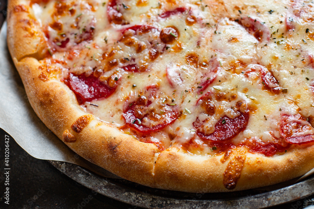 pizza pepperoni with meat sausage and double cheese fast food Takeaway ready to eat portion on the table for healthy meal snack outdoor top view copy space for text food background rustic image pizza pepperoni with meat sausage and double cheese fast food Takeaway ready to eat portion on the table for healthy meal snack outdoor top view copy space for text food background rustic image