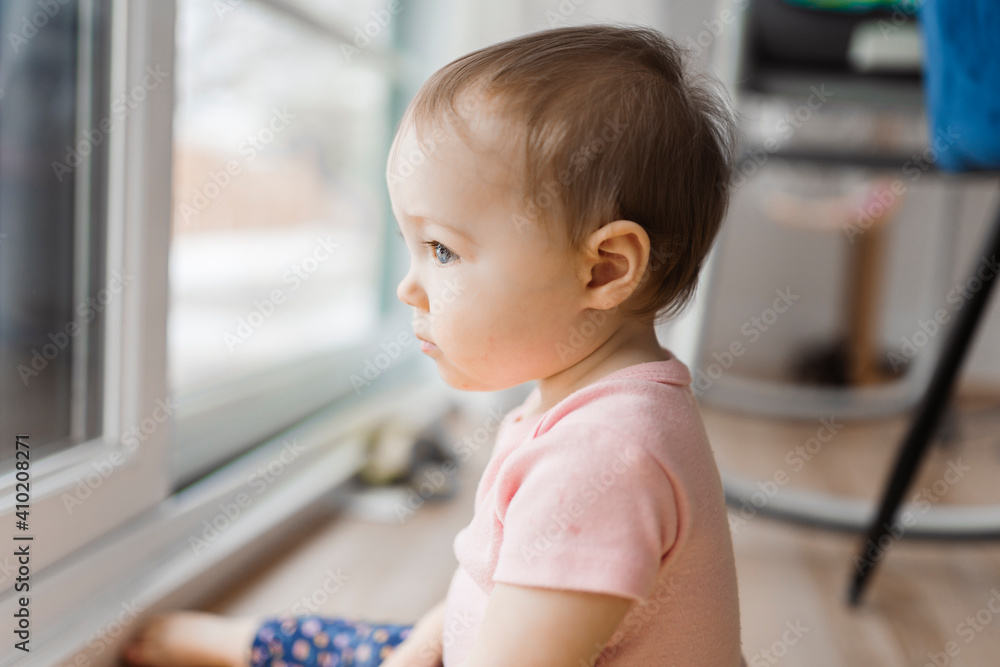 cute and Adorable girl look through window outside cute and Adorable girl look through window outside