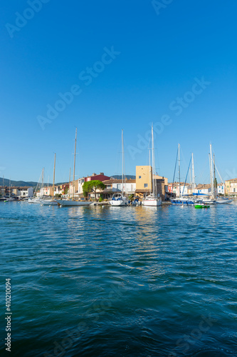 Travel and vacation destination, view on houses, roofs, canals and boats in Port Grimaud, Var, Provence, French Riviera, France © barmalini