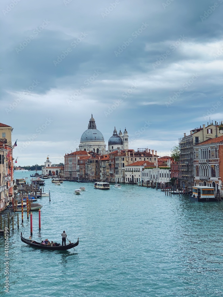 Romantic famouse Venice grand canal Basilica view with charming boats and gondolas 