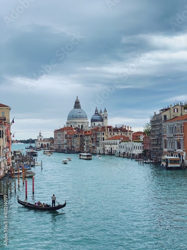 Romantic famouse Venice grand canal Basilica view with charming boats and gondolas 