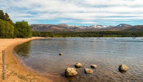 A calm Loch Morlich near Aviemore on a gentle summers day  photo