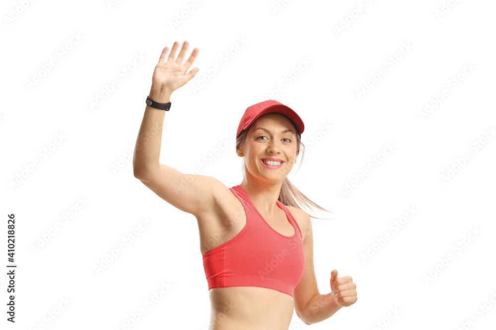 Young female in sportswear waving a the camera Young female in sportswear waving a the camera