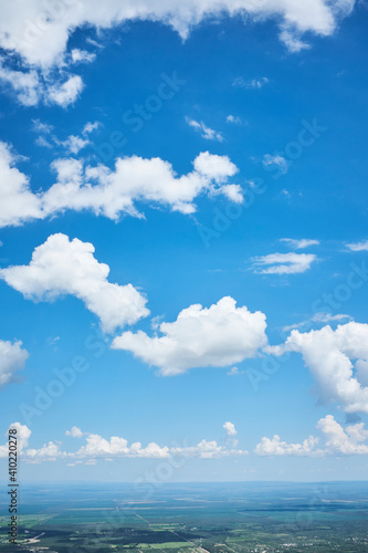 White clouds on blue sky from the mountain. Summer Sky.