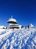 smiling children during a winter trip, a snowy land or winter on a beautiful sunny and cold day. 