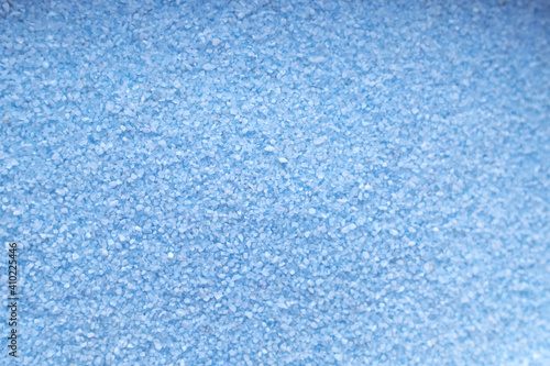 Blue sand texture close up.