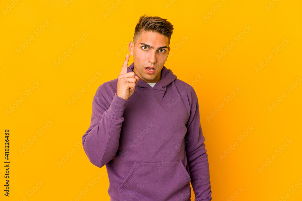Young handsome caucasian man isolated having an idea, inspiration concept. Young handsome caucasian man isolated having an idea, inspiration concept.