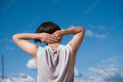 person with arms outstretched