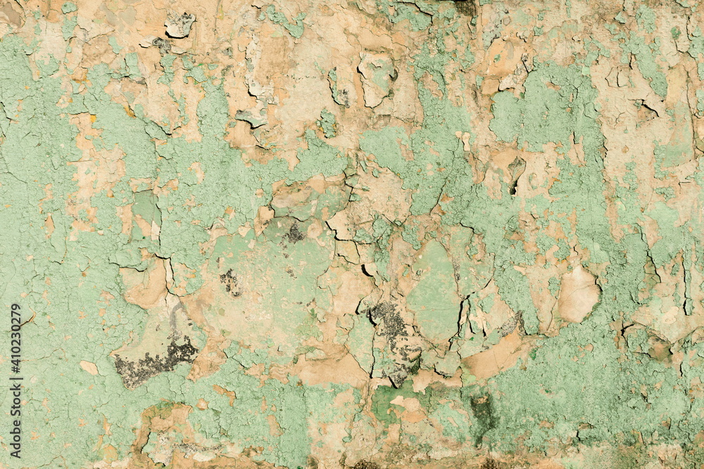Destroyed Peeling Faded Paint Texture Background. Old Urban Cracked Painted Green Surface. Distressed Plaster Wall Rough Backdrop.