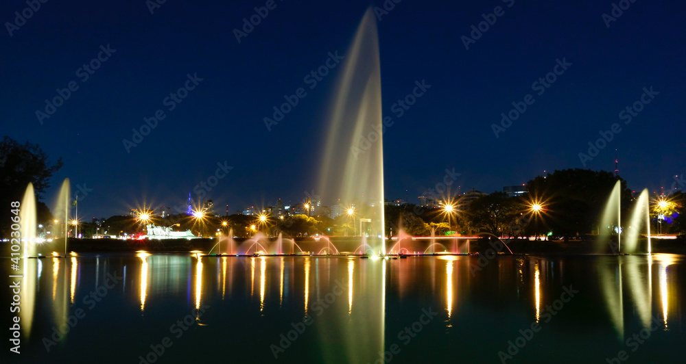 Ibirapuera park fountains and lake at night, Sao Paulo city, Brazil