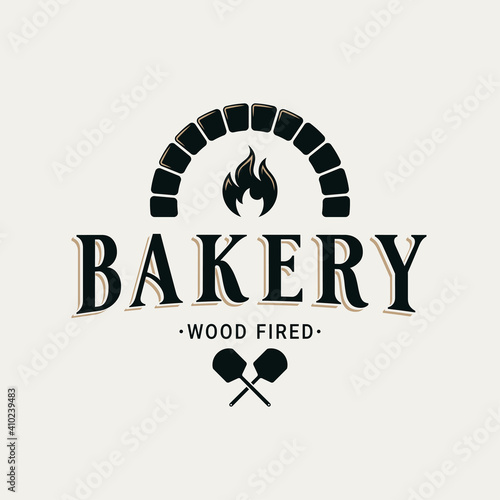 Bakery logo with oven shovel. Wood fired bread
