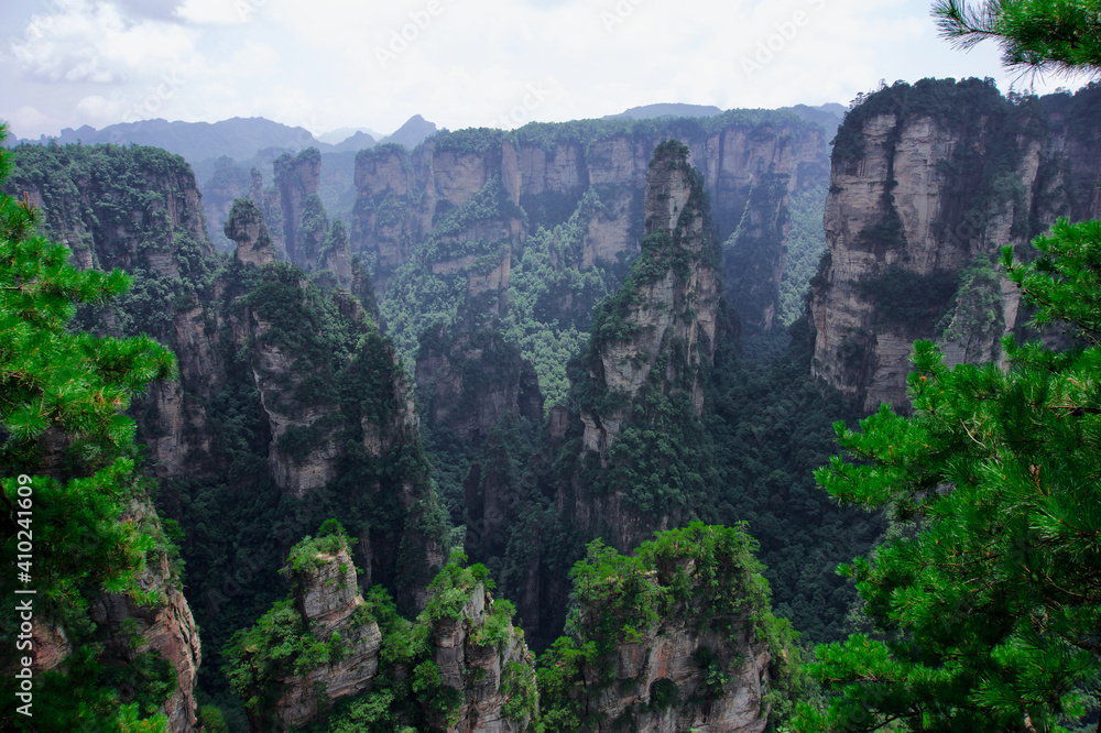 Zhangjiajie Cliff Mountains - National Forest Park Landscape in China.  Dark Avatar Mountains. Mysterious and gloomy cliffs. 