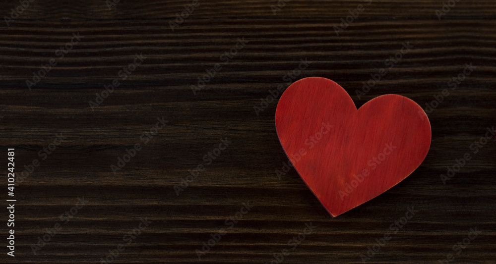 Red heart on a wooden background. St. Valentine's Day. Love Red heart on a wooden background. St. Valentine's Day. Love