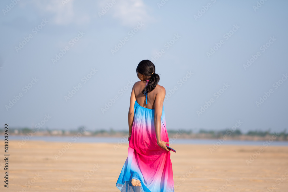 portrait of a beautiful african lady at a beach portrait of a beautiful african lady at a beach