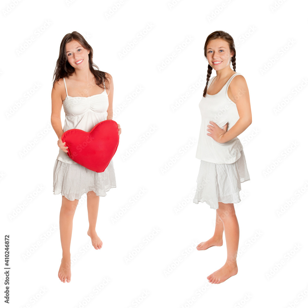 Two full length portraits of a young laughing woman with ponytails and red heart, isolated on white studio background Two full length portraits of a young laughing woman with ponytails and red heart, isolated on white studio background